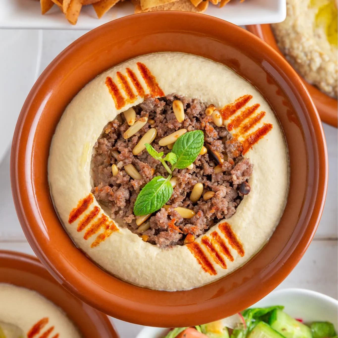 Hummus With Meat & Pine Nuts