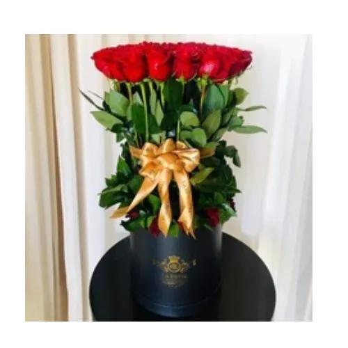 Round black box with red rose