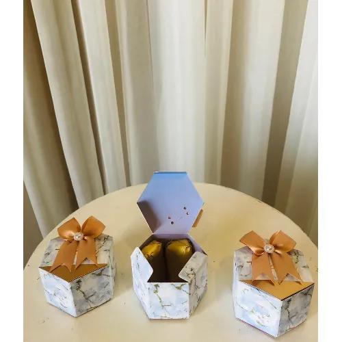 marble box with two chocolate