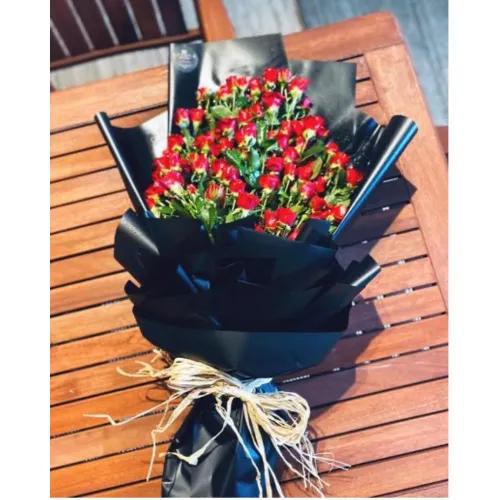 Bouquet of baby rose red with black cover