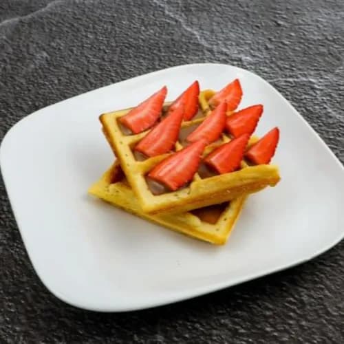 Waffle with fresh fruits and chocolate sauce