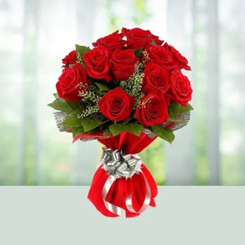 Bunch Of A 12 Red Roses With Net Packing
