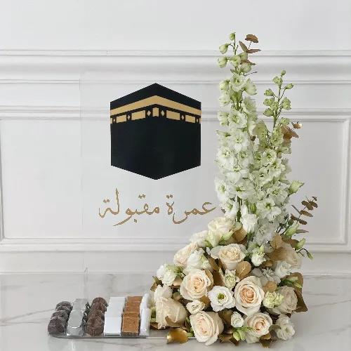 White Umrah acrylic stand with chocolate