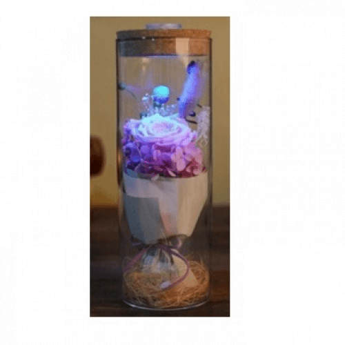 Light Pink Roses In A Glass Jar