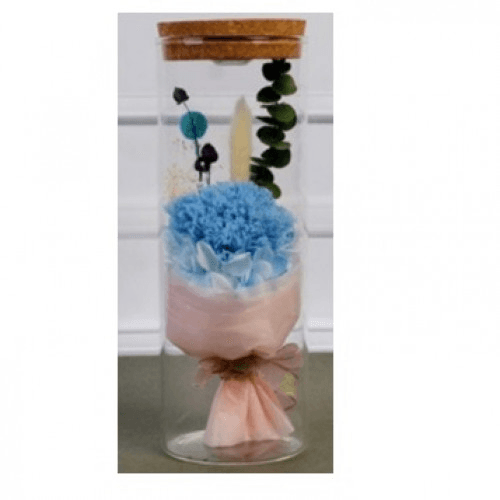 Light Blue Flower In A Glass Jar