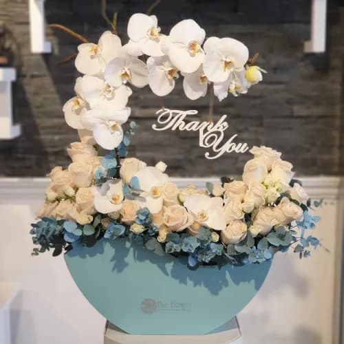 Light Blue Acrylic Box With White Roses And White Baby Roses