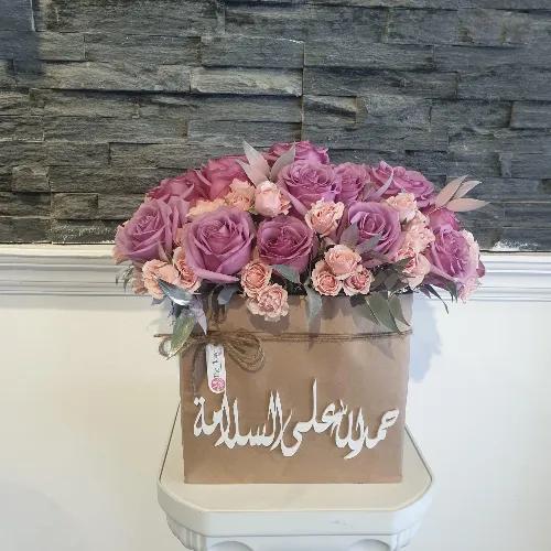 Floral Bag With Purple Roses And Pink Baby Roses