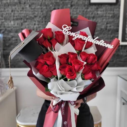 Hand Bouquet With Red Roses