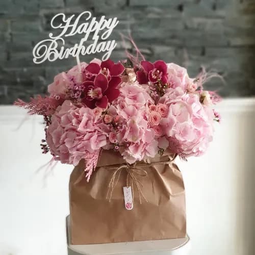 Floral Bag With Pink Hydrangea And Cymbidium