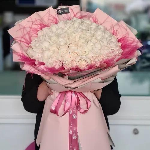 Hand Bouquet With White Roses And Feather Grass