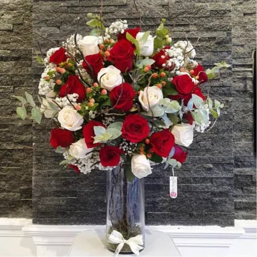 Vase With Red And White Roses