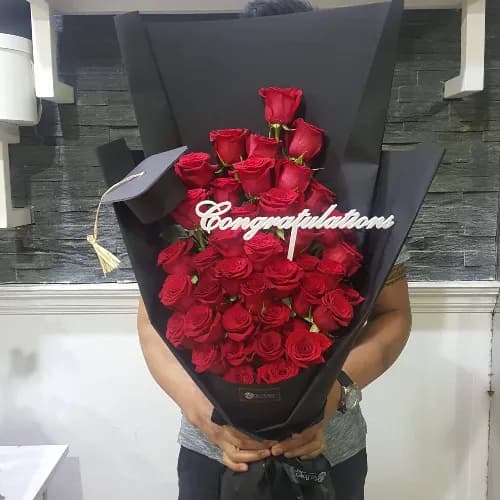 Hand Bouquet With Red Roses For Graduation