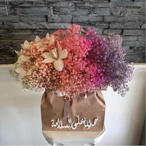 Floral Bag With Gypsophila And Cymbidium