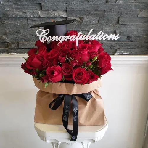 Floral Bag With Red Roses And Red Baby Roses For Graduation