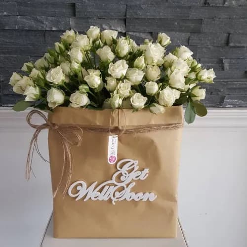 Floral Bag With White Baby Roses