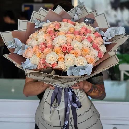 Hand Bouquet With White And Peach Roses