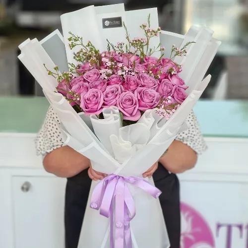 Hand Bouquet With Roses And Wax Flowers