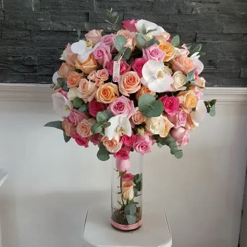 Vase With Fuchsia And Peach Roses