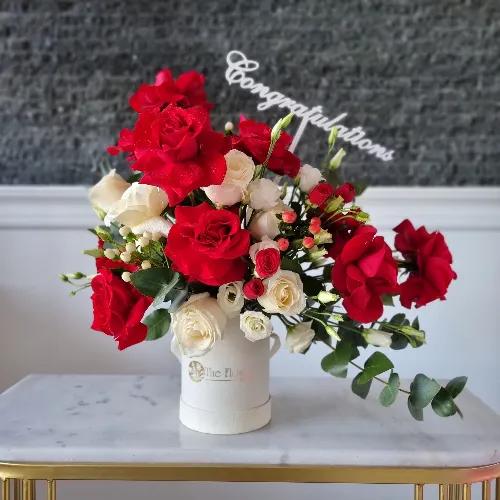 White Box With Red And White Flowers For Graduation