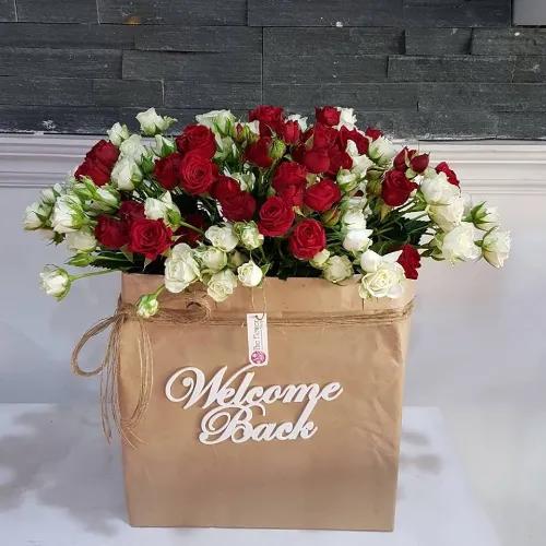 Floral Bag With White And Red Baby Roses