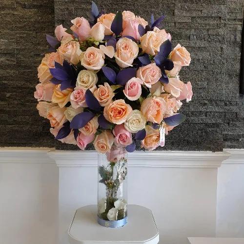 Vase With Peach And Pink Roses