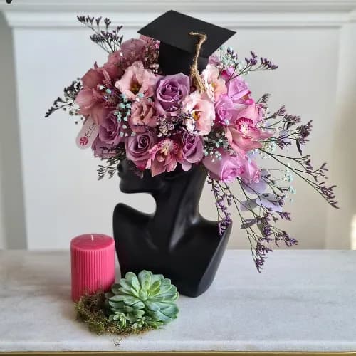 Face Stand With Purple Flowers For Graduation