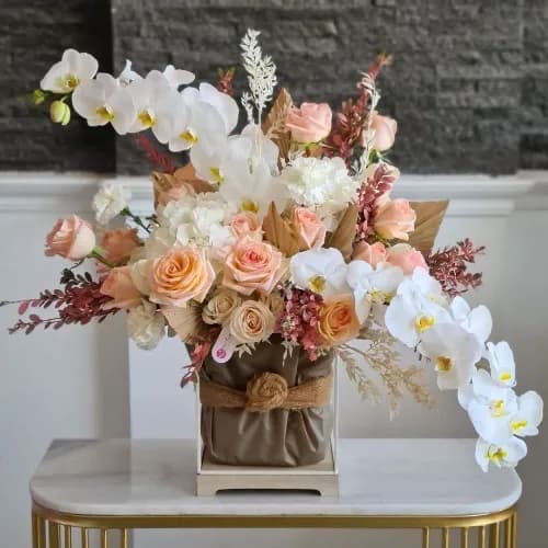 White Flower Stand With White And Peach Flowers