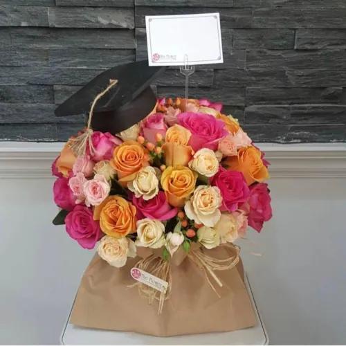 Floral Bag With Peach And Pink Flowers For Graduation