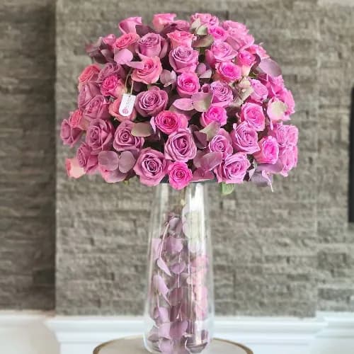 Tall Clear Vase With Pink And Purple Roses