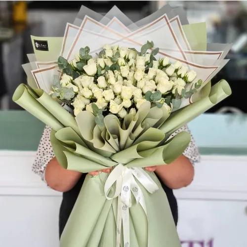 Hand Bouquet With White Baby Roses