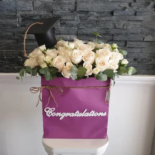 Floral Bag With White Roses And Green Leaves