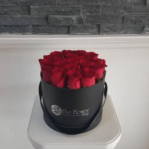 Black Round Box With Flat Red Roses