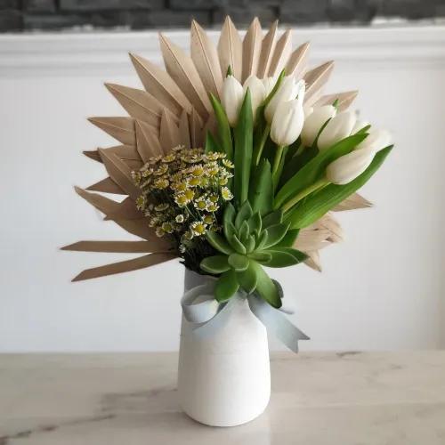 Vase With White Tulips And Palm Leaves