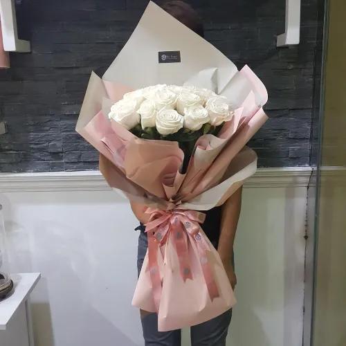 Hand Bouquet With White Roses