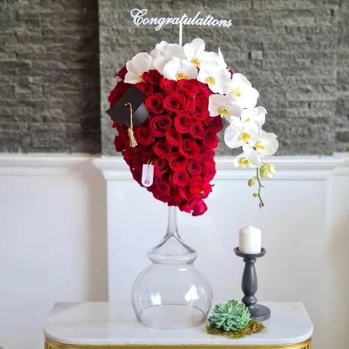 Tall Glass Vase With Roses And Phalaenopsis