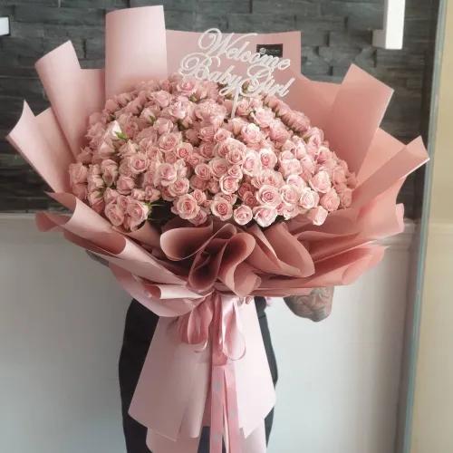 Hand Bouquet With Pink Baby Roses