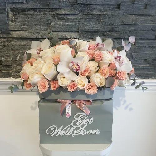 Floral Bag With White Roses And Peach Baby Roses