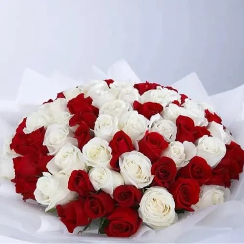 A Mixture Of White And Red Flowers