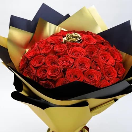 Natural Flower Arrangement With A Golden Rose In A Middle