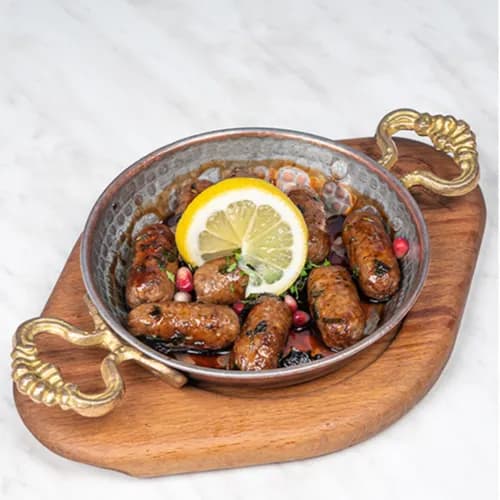 Mini Grilled Sausages with Pomegranate  Molasses