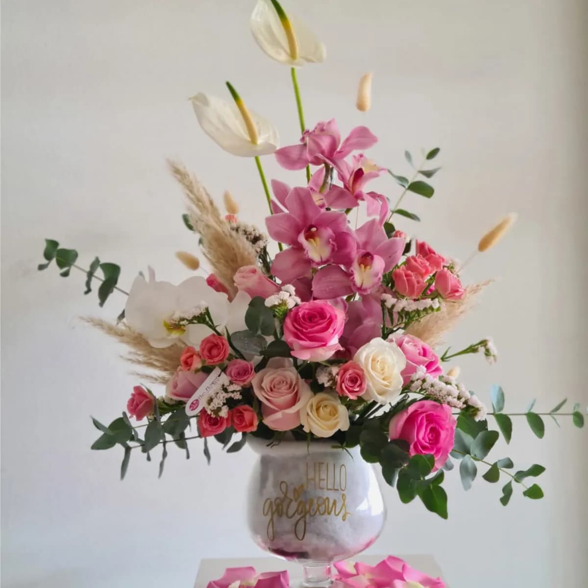 Glass Vase With Pastel Colored Flowers