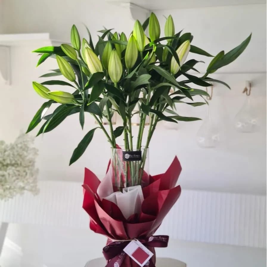 Clear Glass Vase With Lilies