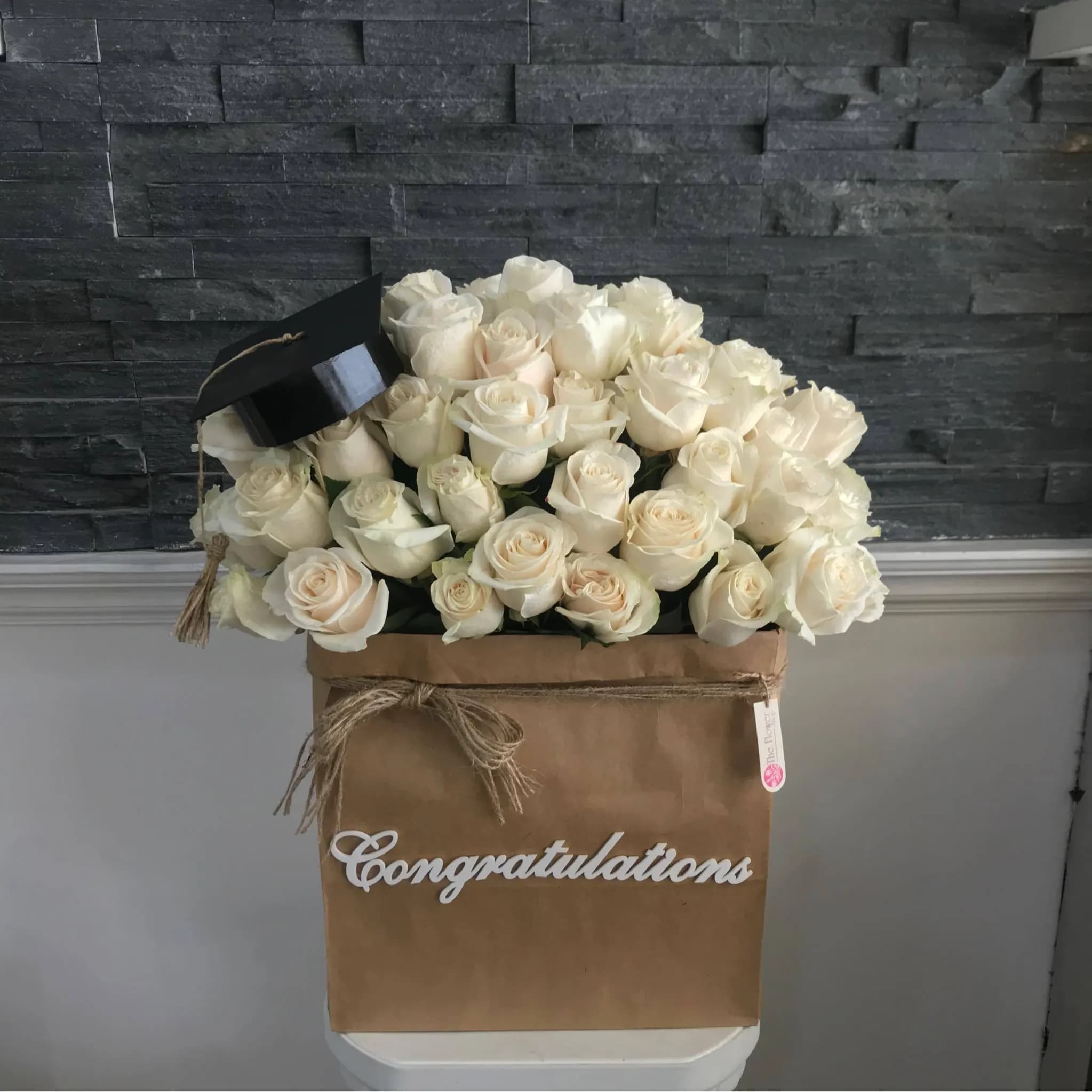 Floral Bag With White Roses For Graduation