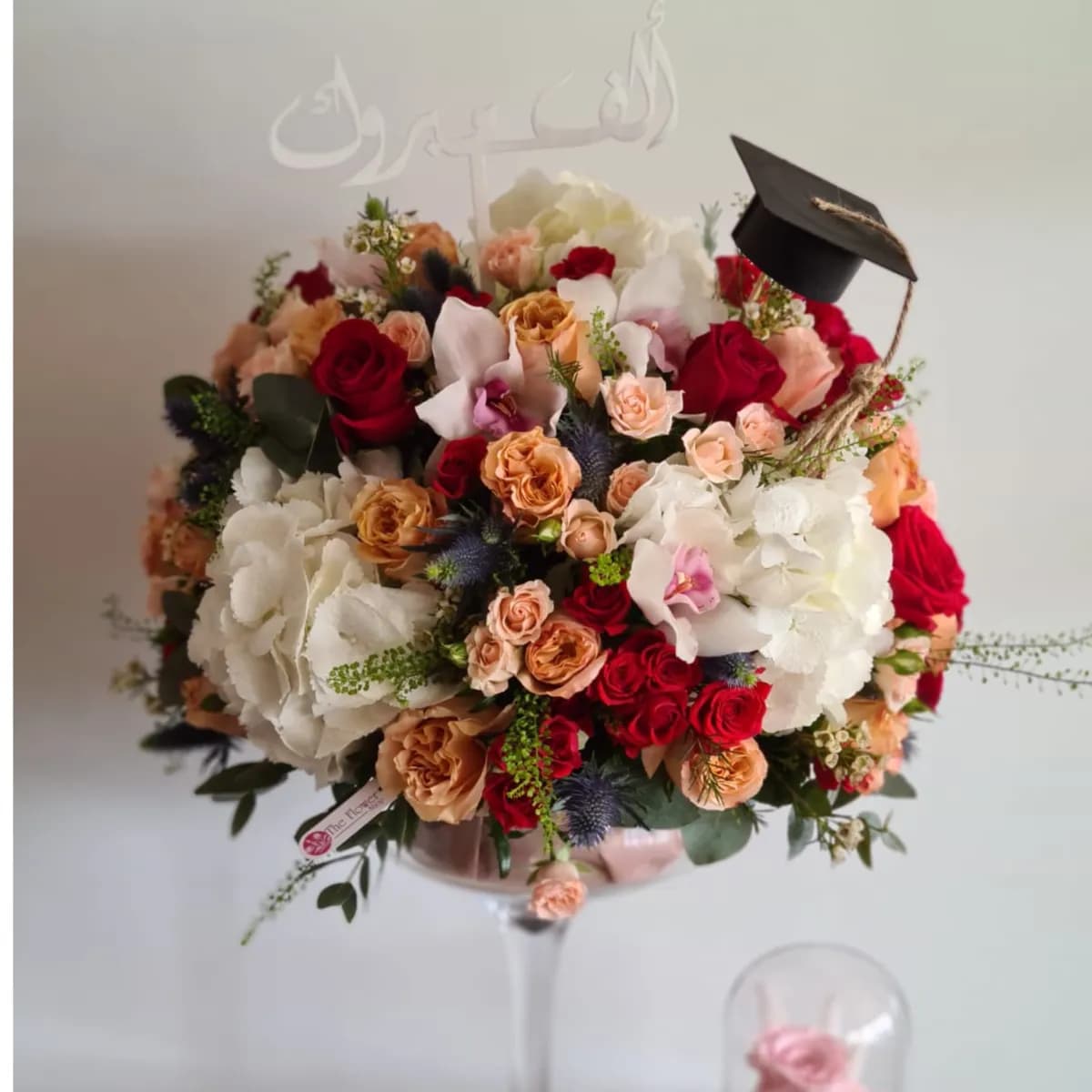 Flower Vase Arrangement With Red And Peach Flower For Graduation