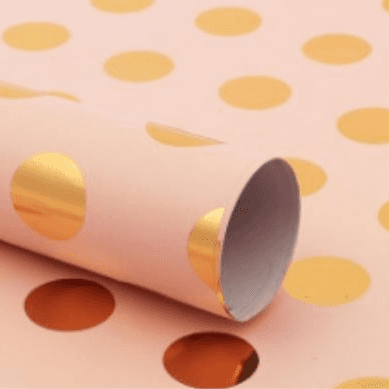 gold polka in pink wrapper paper
