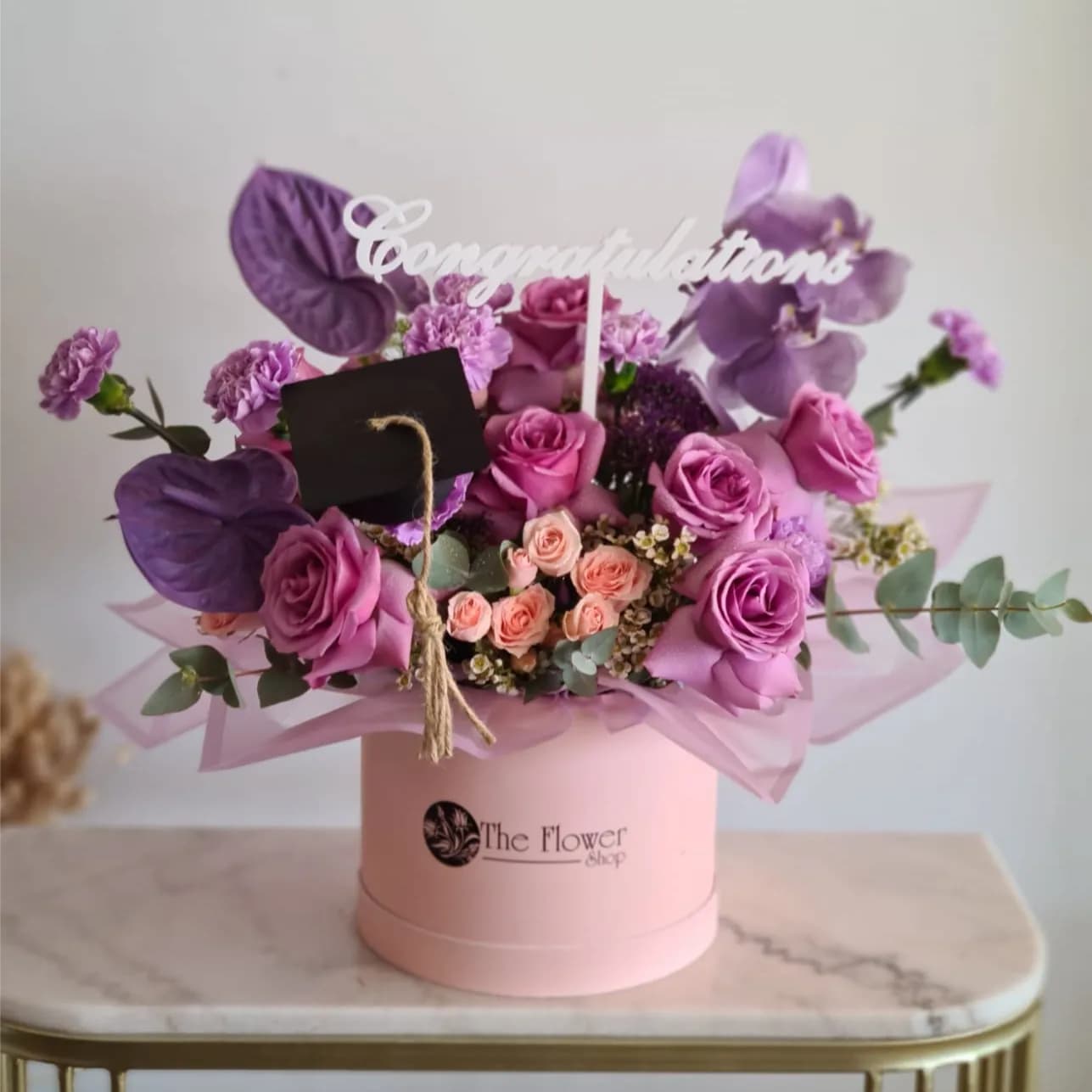 Pink Box With Purple Mixed And Peach Flowers For Graduation