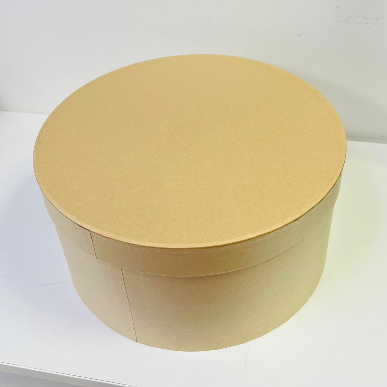 large brown round gift box