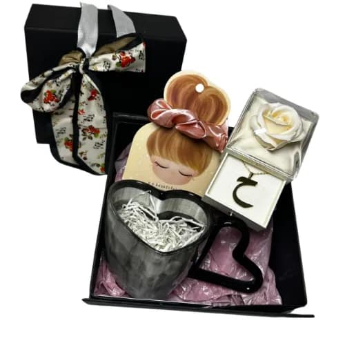 Luxury gifts, a special gift containing a heart mug, a hair tie, and a rose box with the letter you want