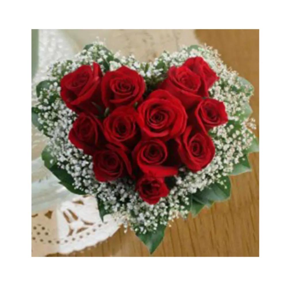 Heart-Shaped Arrangement Of Red Roses And Gypsophila