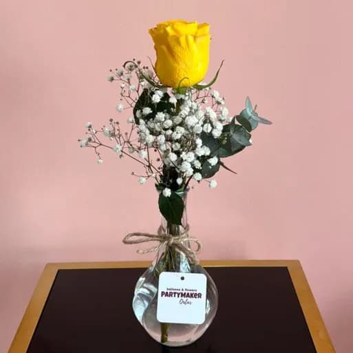 Single Yellow Rose In A Vase